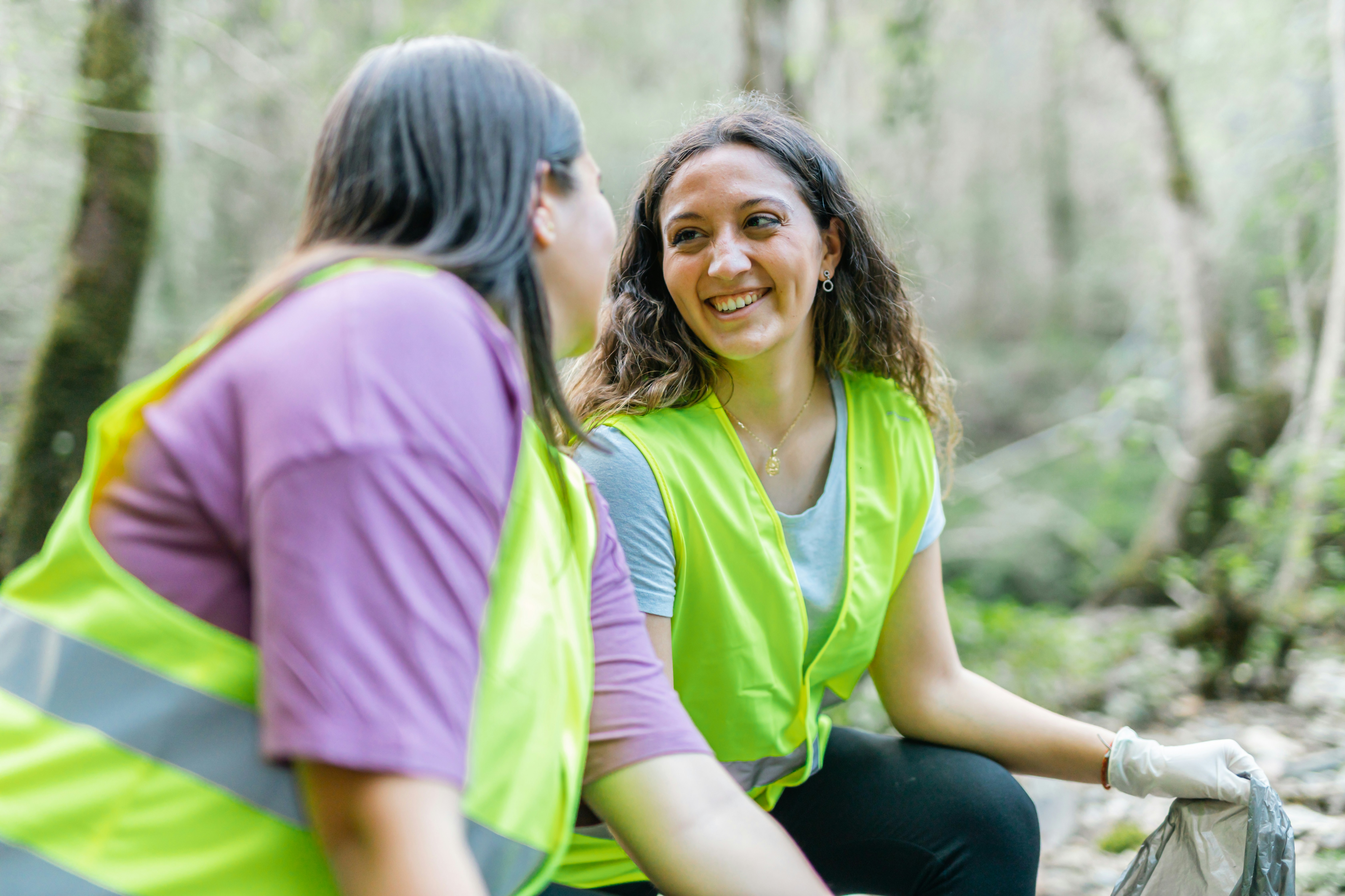 volunteers in conversation reflective moment candid
