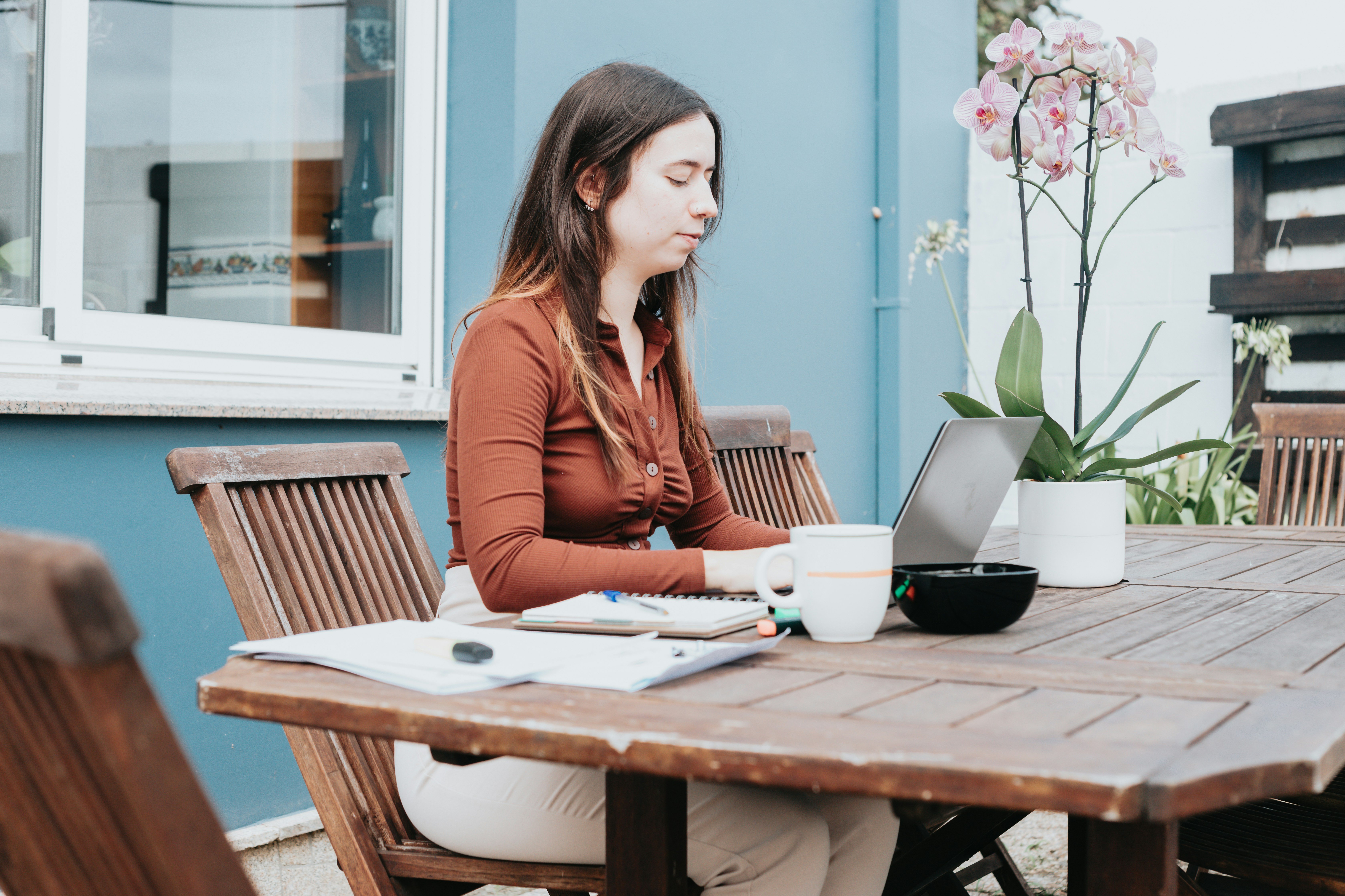 natural, candid workplace moments showing real human emotion (e.g. a thoughtful one-to-one, quiet reflection, supportive conversation)