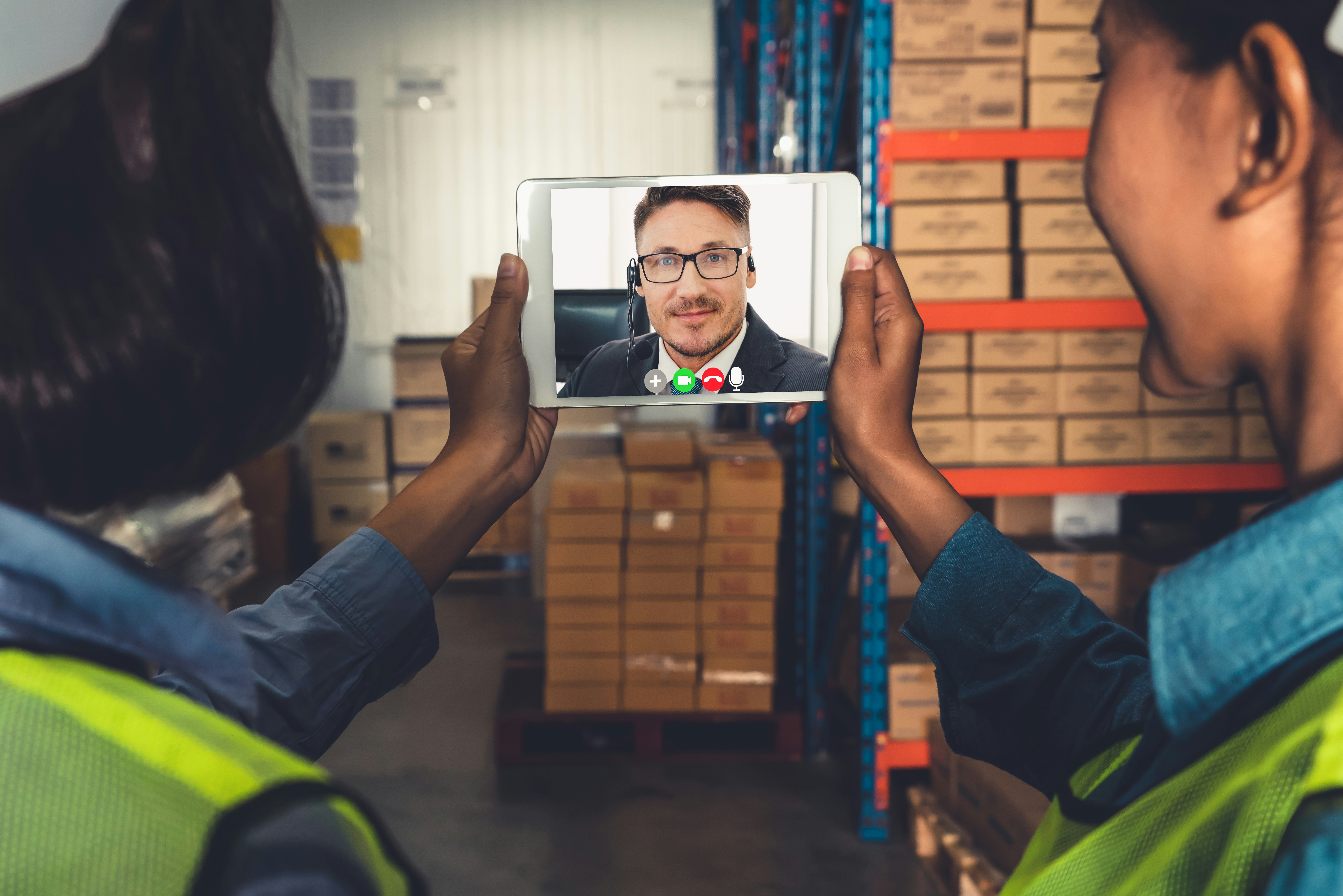 A senior leader connecting directly with frontline employees across multiple retail through video