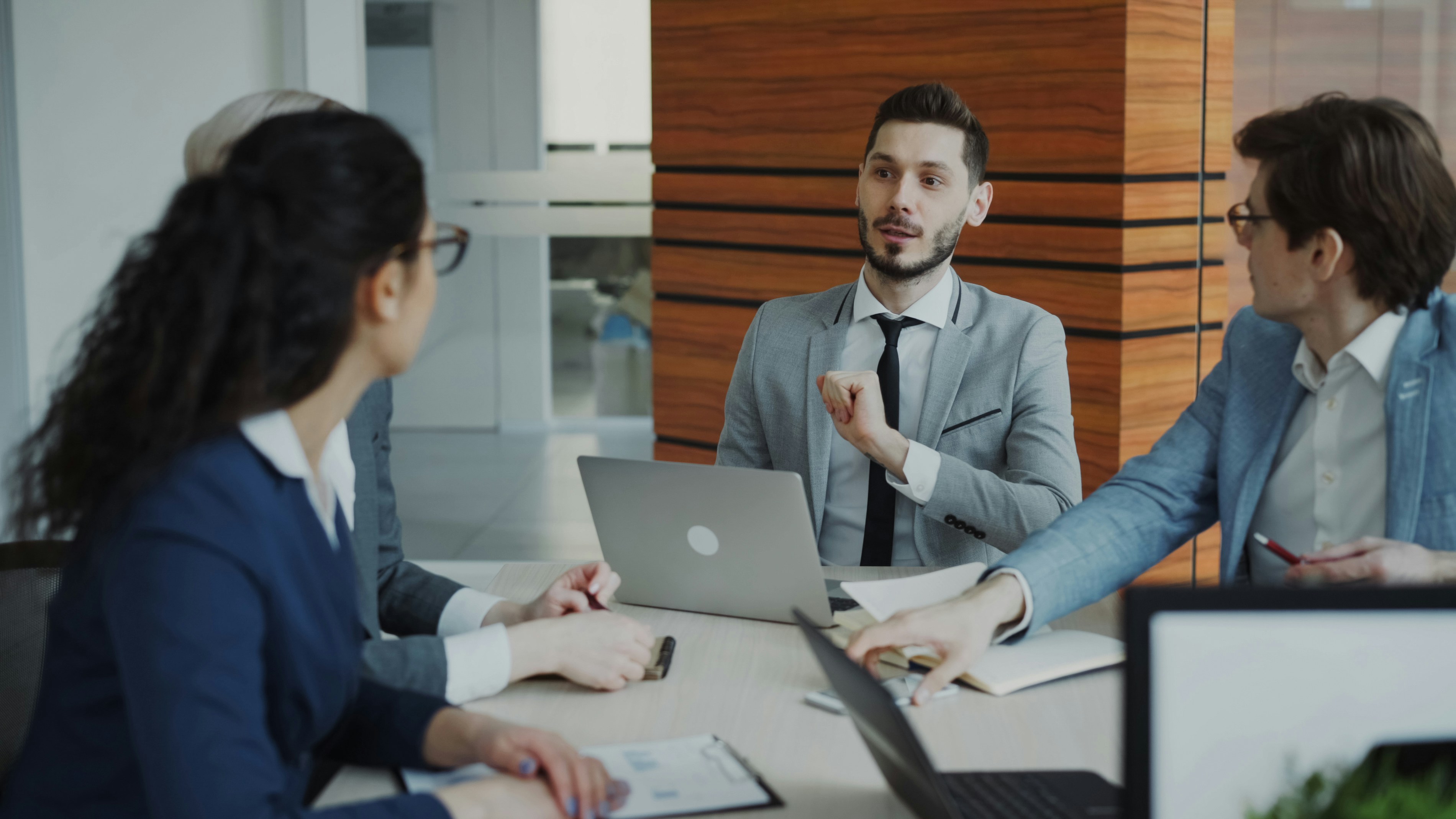 manager listening meeting thoughtful workplace discussion